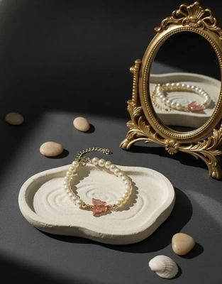 Elegant Pearl Bracelet with Pink Butterfly Charm