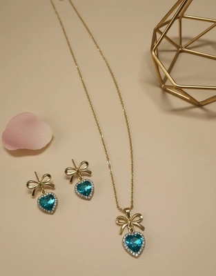 Dainty Gold Ribbon Stud Earrings with Aquamarine Heart Detail