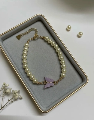 Elegant Pearl Bracelet with Purple Butterfly Charm