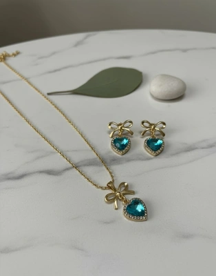 Dainty Gold Ribbon Stud Earrings with Aquamarine Heart Detail