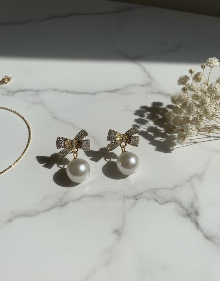 Golden Bow Pearl Drop Earrings