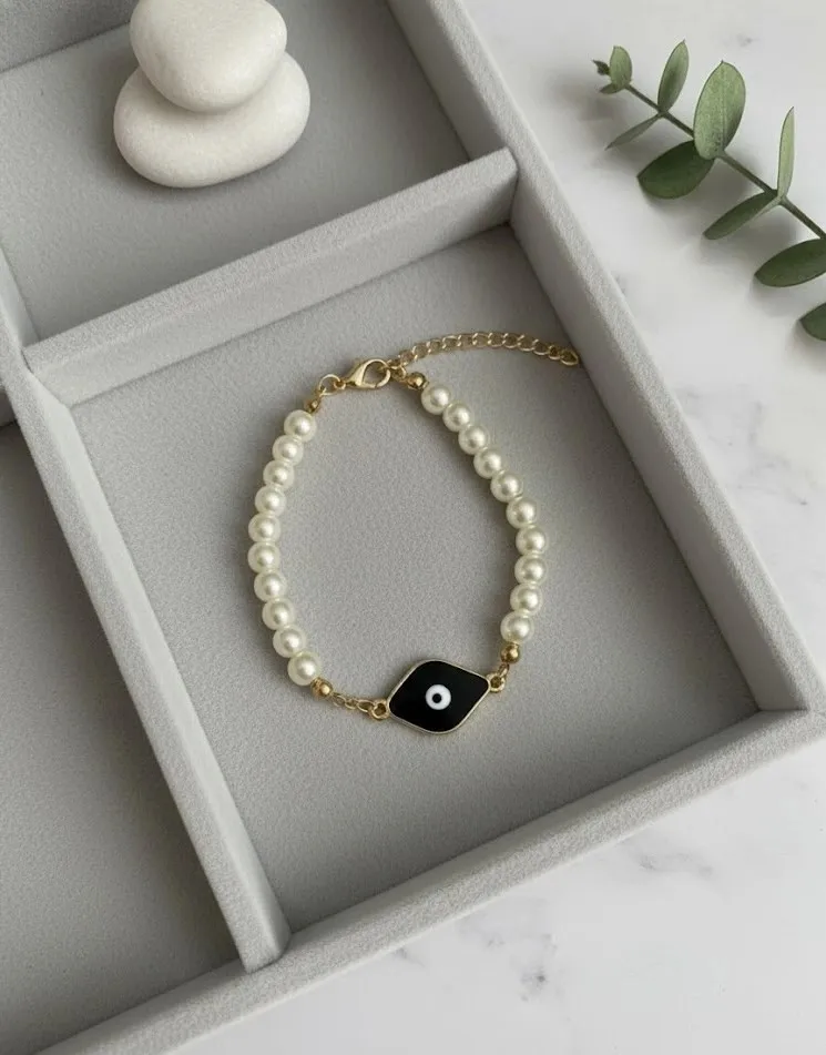 Elegant Pearl Evil Eye Bracelet with Black Enamel Charm